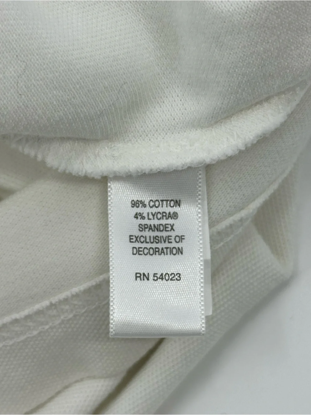 Banana Republic White Polo with Subtle Elephant Logo